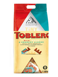 Продуктови Категории Шоколади Toblerone Млечен, бял и млечен с хрупкав бадем 32 бр 256 гр